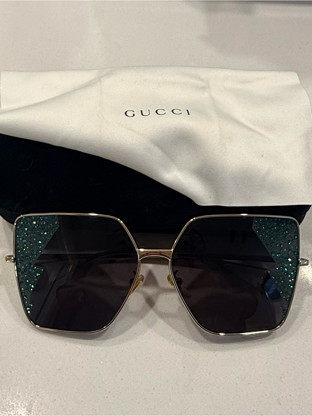 Gucci Gold Frame Sunglasses with Green Rhinstone Accents